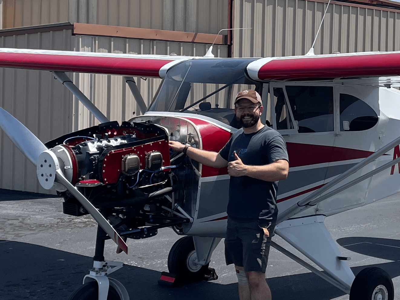 Jason in front of his Tri-Pacer